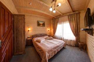 Курортные отели Hotel Podgorie Spa Буковель Коттедж с 3 спальнями-1